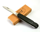 Folding BW German army pocket knife with Bundeswehr eagle on olive handle, made by MFH, displayed on branded box.