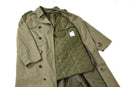 Genuine Dutch Army women's khaki long trench coat with quilted lining, belted waist, and button details.