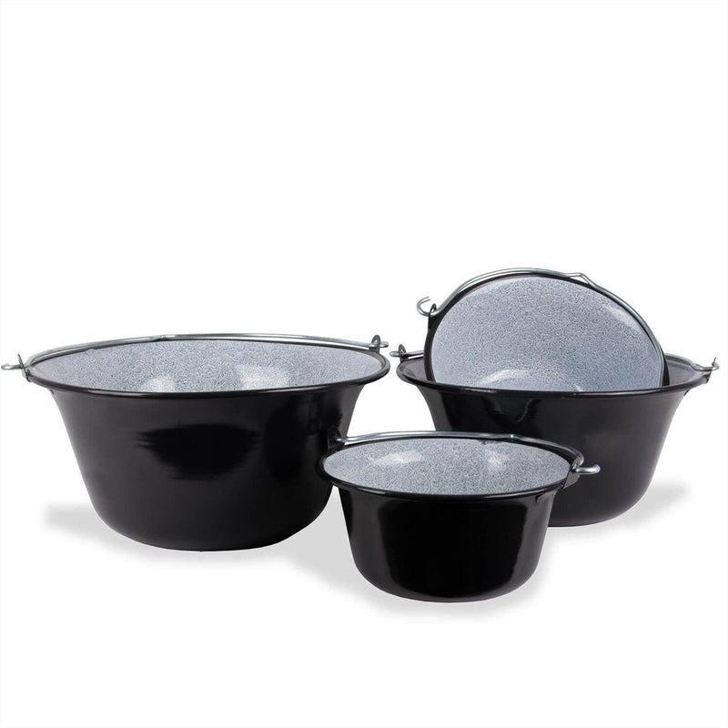 Three black enameled Dutch ovens with hanging handles and speckled gray interiors for outdoor camping cooking.