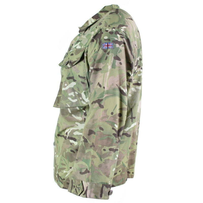 Side view of genuine British Army MTP camouflage combat field jacket with chest pockets and Union Jack patch on sleeve