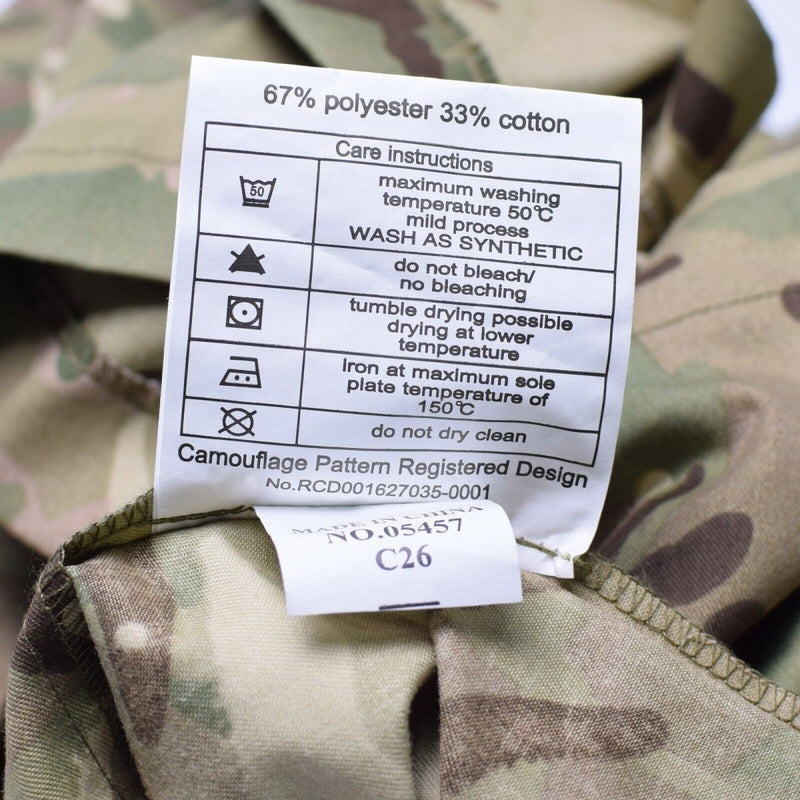 Care label on genuine British army MTP camouflage field jacket showing fabric and washing instructions.