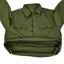 Genuine Bulgarian army olive green field jacket with buttoned chest pockets and rugged military design.