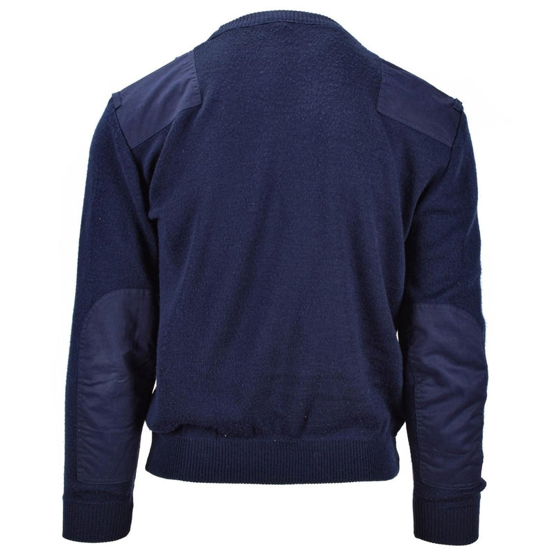 Back view of navy blue Dutch army sweater with reinforced elbows and shoulders for durability.