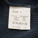 Size L fabric label for Dutch military surplus blue sweater, 50% acrylic and 50% merino wool blend, care instructions shown