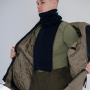 Man wearing Genuine Dutch Military thermal long sleeve shirt with high neck base layer under coat