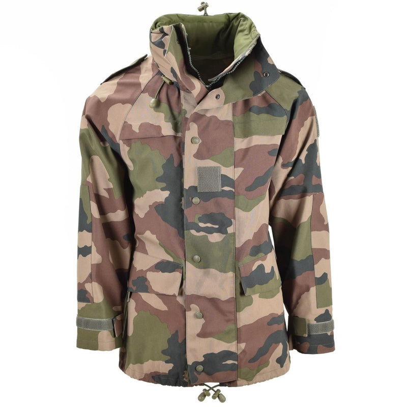 Genuine French army waterproof trilaminate camo jacket with hood, storm flap, multiple pockets, and adjustable fit.