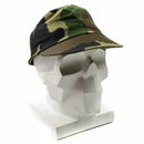Vintage French army field cap F1 in CCE camouflage pattern displayed on a white mannequin head.