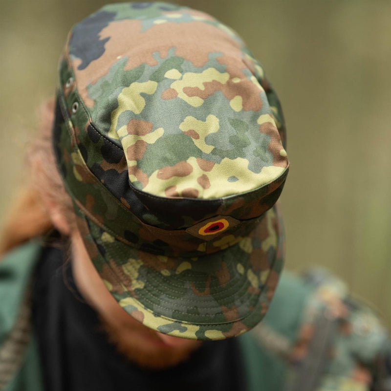 Close-up of a Genuine Original German army Flecktarn cap in BW woodland camo worn outdoors