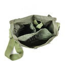 Open genuine Polish Soviet-era OM-14 gas mask carrying bag with adjustable shoulder strap in green canvas material.