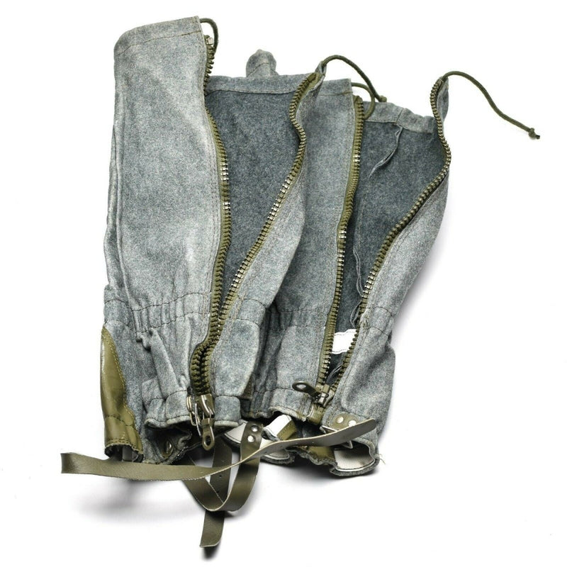 Genuine Swiss military surplus gray wool gaiters with zippers and drawstrings for hiking and outdoor protection.