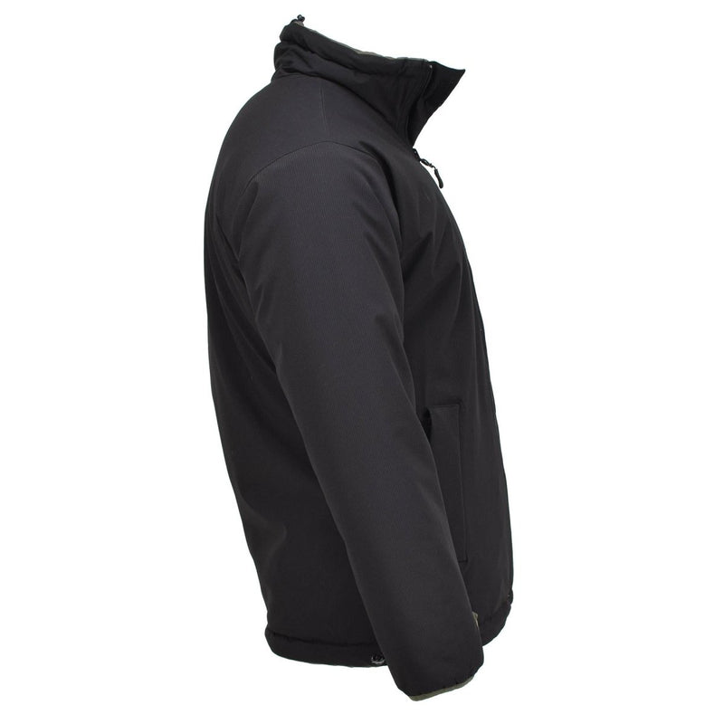 Side view of MIL-TEC German Military reversible cold weather jacket in black, windproof and insulated for warmth.