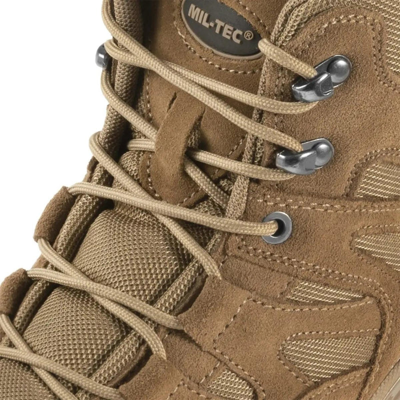 Close-up of coyote MIL-TEC squad boots showing suede material, laces, and reinforced stitching detail