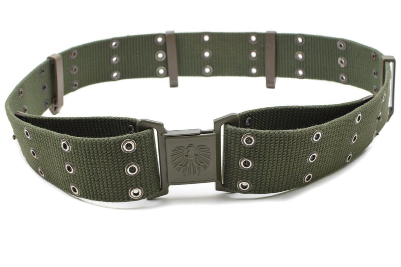 Original Austrian military combat belt in olive drab canvas with Alice webbing and metal buckle showing eagle insignia.