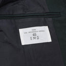 Close-up of the 1986 manufacturing label inside the Original Belgian Army green wool blouson jacket.