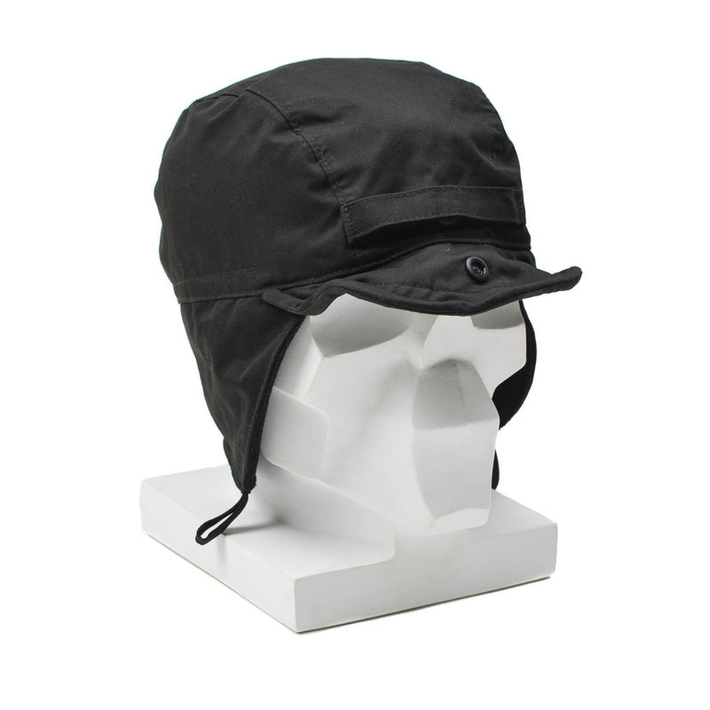 Black Dutch paratrooper winter hat with ear flaps, brim, and windproof design on white mannequin head