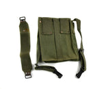 Original French army 5-cell magazine pouch with adjustable strap and durable green canvas construction.