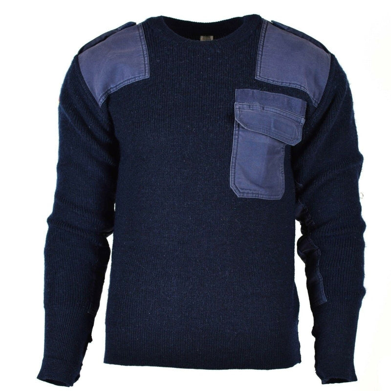 Blue German army pullover wool sweater with reinforced shoulders, elbows, chest pocket, and embroidered flag patch on sleeve.