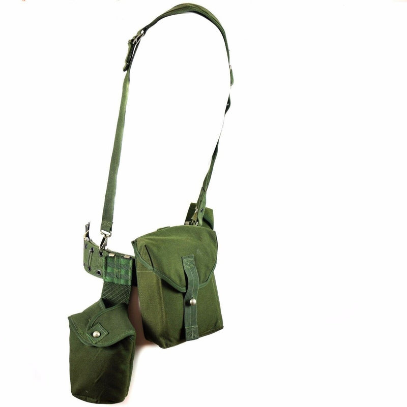 Swedish military webbing rig system 304 with tactical belt, H-straps suspenders, and multiple utility pouches in green.