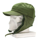 Original Swedish military winter field cap in green with earflaps and faux fur lining for cold weather protection.