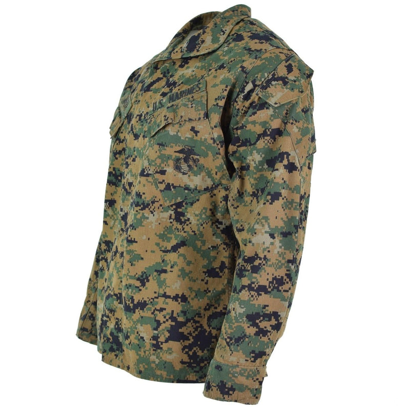 Original US Army digital woodland camo BDU jacket with chest and arm pockets, adjustable cuffs, and durable construction.