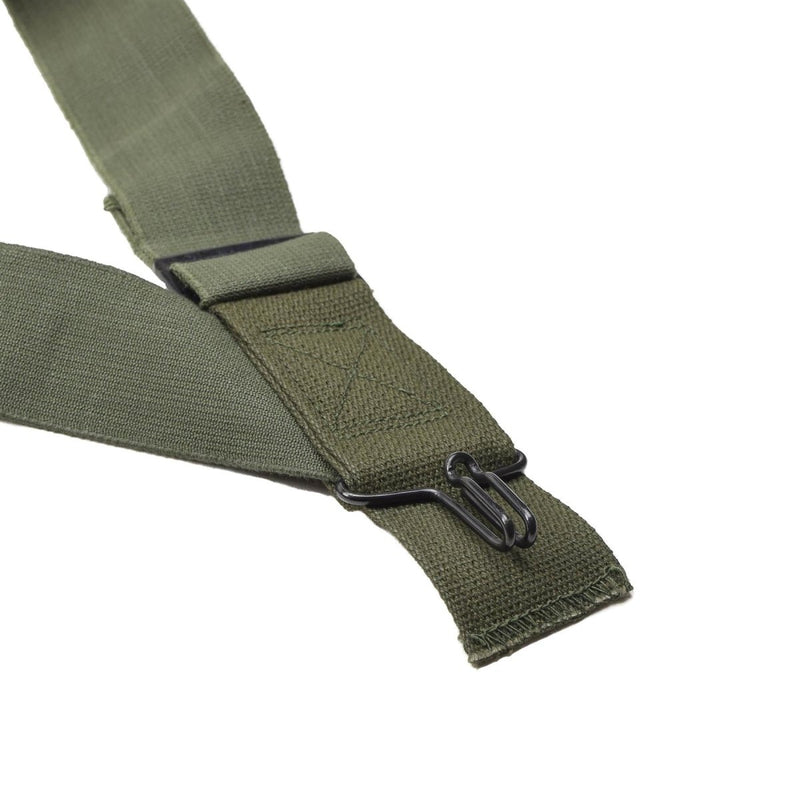 Genuine U.S. military M1950 olive green suspenders with metal clips and adjustable shoulder harness for durable support.