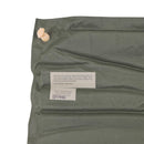 Close-up of olive green Original U.S. military Therm-A-Rest self-inflating lightweight sleeping pad corner with valve and label