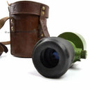 Original Yugoslavian army ON-M59 monocular sight tool with rubber eye cup and vintage leather carrying case.