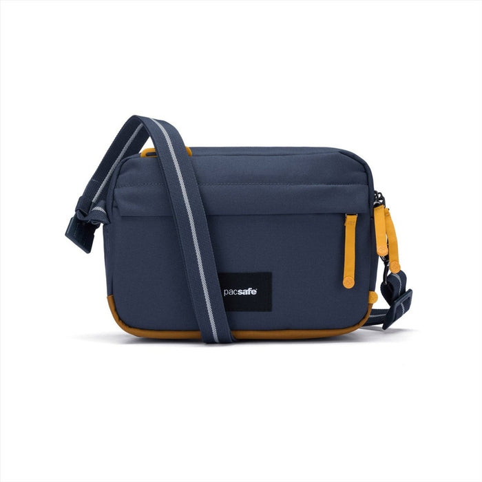 Marineblaue Pacsafe GO Anti-Diebstahl-Umhängetasche 2,5 l mit gelben Akzenten und verstellbarem Schultergurt, wasserabweisendes Design
