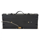 Folded Primus Alika portable dual burner outdoor camping stove with handle and gas connection hose visible